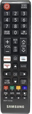 A black Samsung TV remote control is shown against a black background.