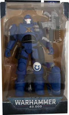A Warhammer 40,000 action figure in its packaging.
