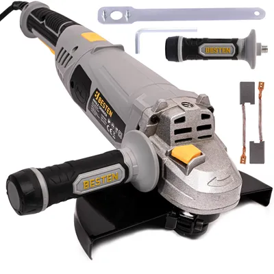A studio shot of an angle grinder and its accessories on a white background.