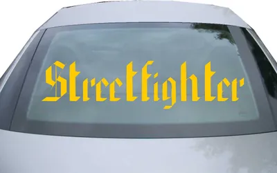 Produktbild von Indigos UG - Aufkleber Heckscheibe & Motorklappe DE2114 - gold - 600x142 mm - Streetfighter - Auto Scheiben Fenster Heckklappe Tuning Racing JDM - Die cut