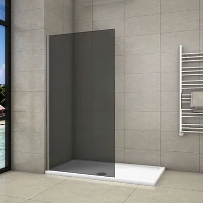 A modern bathroom with a walk-in shower enclosure.