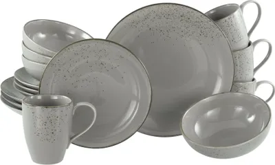 A collection of grey stoneware dinnerware, including plates, bowls, and mugs, arranged on a white background.