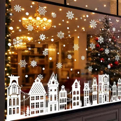 Produktbild von Selbstklebende Fensterbilder für Weihnachten mit Winterhäusern und Schneeflocken