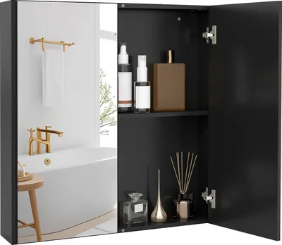 A black medicine cabinet with a mirrored door is shown open, displaying various bathroom products and a bathtub reflected in the mirror.