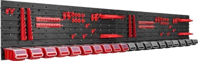 A wall-mounted storage system with multiple compartments and tool holders.