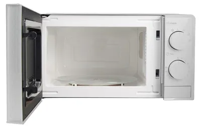 Interior view of an open microwave oven.