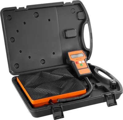 A portable digital scale with a platform and a handheld display unit, shown open inside its black carrying case.