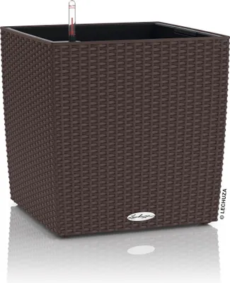 A brown woven planter with a water level indicator inside.