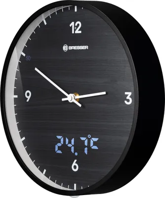 A black wall clock with a white face and black numbers.