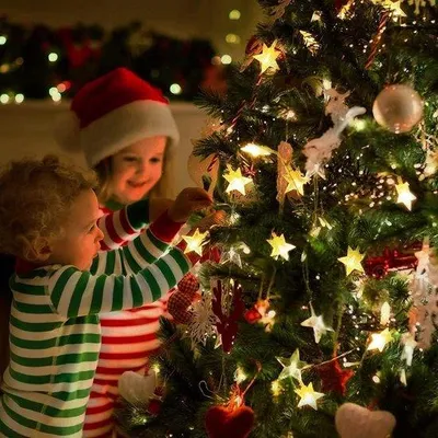 Immagine prodotto di Ghirlande luminose a LED con batterie - 5,8 m, 40 stelle - Luci natalizie per interni, decorazioni per matrimoni, Halloween, tende e feste di compleanno