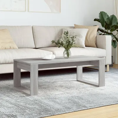 A modern living room scene with a couch and coffee table.