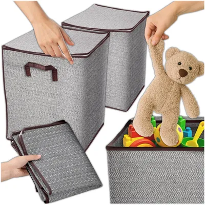 Hands interacting with storage bins and toys.