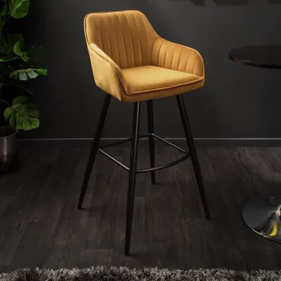 A bar stool in a room setting.