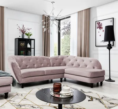 Productafbeelding van Designbank CHARLOTTE, model Ecksofa, bekleed met fluweelstof in een lichtroze kleur. Inclusief ottoman (voetbank) aan de rechterkant