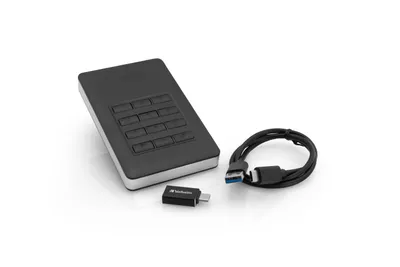 A black external hard drive with a keypad, a USB cable, and a USB-C adapter are arranged on a white background.