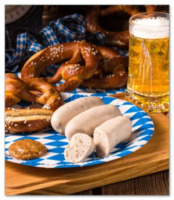Produktbild von Wallario Herdabdeckplatte aus Glas, Größe 52 x 60 cm 1-teilig, Motiv Bayerische Brotzeit mit Weißwurst, Brezel und Bier