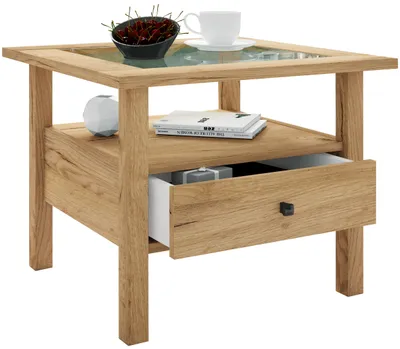 A wooden side table with a glass top, a shelf, and a drawer, displayed against a white background.