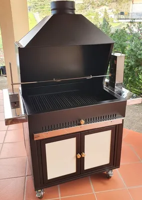 Immagine prodotto di Barbecue a carbonella con girarrosto elettrico 80x65