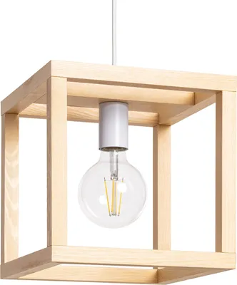 A close-up studio shot of a wooden cube pendant light with a clear glass bulb.
