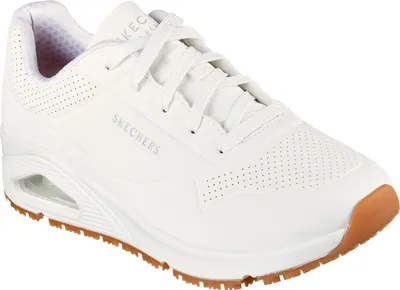 A white Skechers UNO SR shoe with a brown sole.