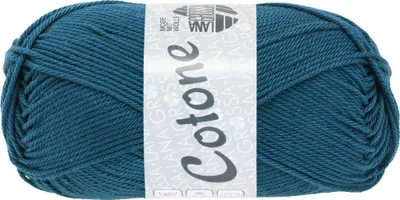 A ball of teal yarn with a label.