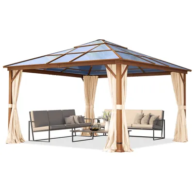 A wooden gazebo with a transparent roof and beige curtains, furnished with two sofas and a coffee table.