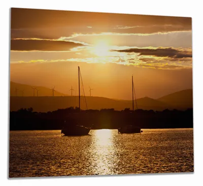 Produktbild von Wallario Herdabdeckplatte aus Glas, Größe 60 x 52 cm 1-teilig, Motiv Schiffe in der Abenddämmerung auf dem Meer