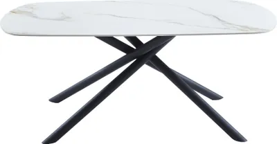 A modern dining table with a white marble-effect top and black metal legs.