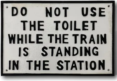 Produktbild von Schild Wandschild DO NOT USE THE TOILET WHILE TRAIN Eisenbahn Lok Antik-Stil