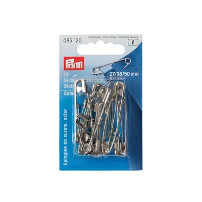 A package of safety pins on a white background.