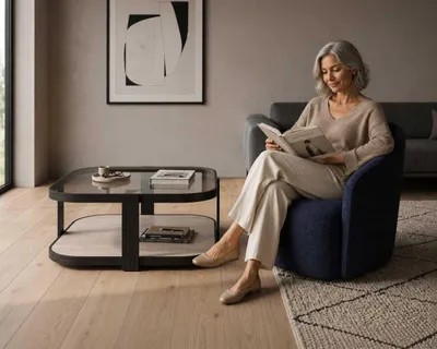 Immagine prodotto di Tavolino da caffè nero, con piano in vetro e struttura in legno, design moderno ed elegante, ideale per il soggiorno
