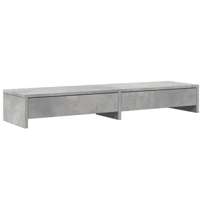 A product shot of a monitor stand with drawers.