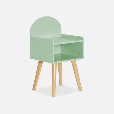 A light green children's nightstand with wooden legs against a white background.