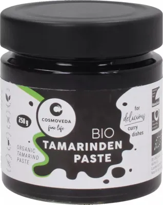 A jar of Cosmoveda Tamarinden Paste on a white background.
