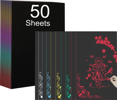 A stack of black paper sheets with colorful edges and a sample sheet showing colorful drawings.