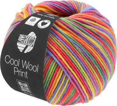 A ball of multicolored yarn with a black label.