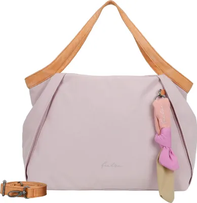 A light pink slouchy shoulder bag with tan leather straps and a multi-colored tassel.