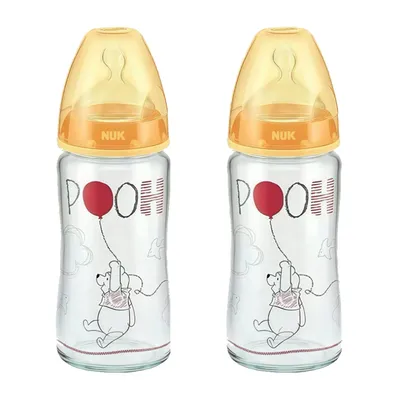 Two baby bottles with Winnie the Pooh design.