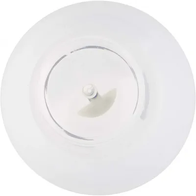A top-down view of a clear plastic bottle cap with a small dispensing mechanism in the center.
