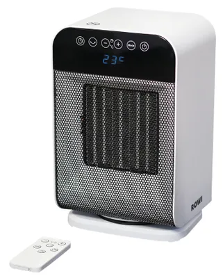 A white ROWI ceramic heater with a black control panel and a remote control on a white surface.