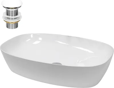 A white ceramic oval washbasin with a chrome drain assembly.
