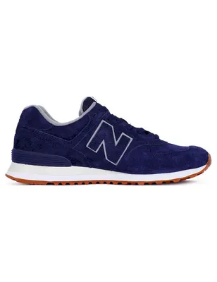 A side view of a single navy blue New Balance sneaker against a white background.