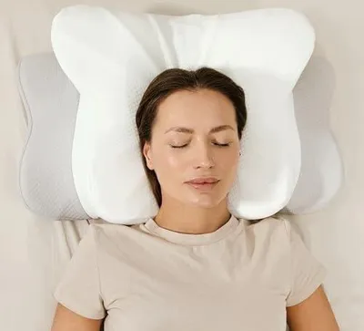 Zdjęcie produktu dla Poduszka ergonomiczna pod kark z memory foam dwie wysokości dla snu