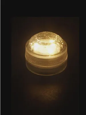 Produktbild von 4 x Unterwasser LED Teelicht mit 3 SMD warmweiß inkl. Batterie CR2032