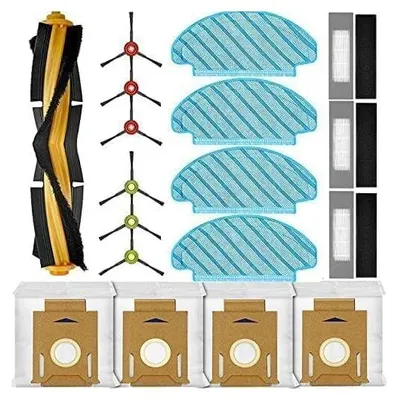 A collection of vacuum cleaner replacement parts laid out on a white background.