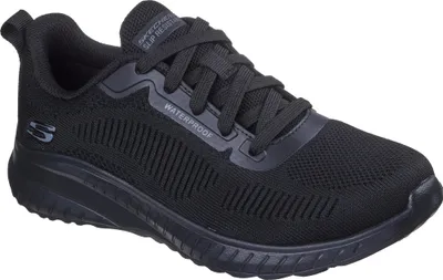 A black Skechers shoe is shown from a side angle against a white background.