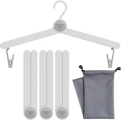 Imagen del producto de Ganchos para ropa de viaje - Para viajes - Plegables - 4 unidades - Blancos