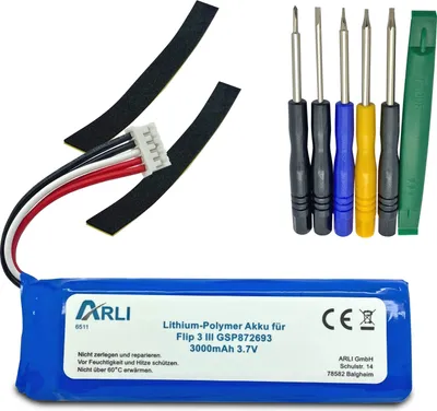 A battery pack and a set of screwdrivers are laid out on a white background.