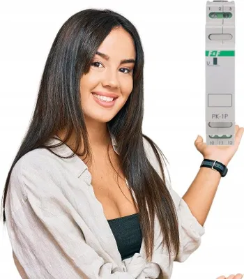 A woman is holding an electronic device.