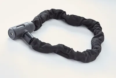 Imagen del producto de Candado para bicicleta Mottez, tipo cadena, con funda de tela, fabricado en Francia, Unión Europea, longitud 100 cm
